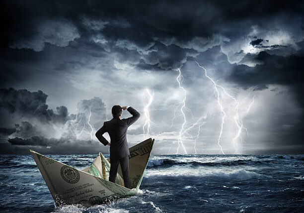 businessman on dollar boat with storm and lightning